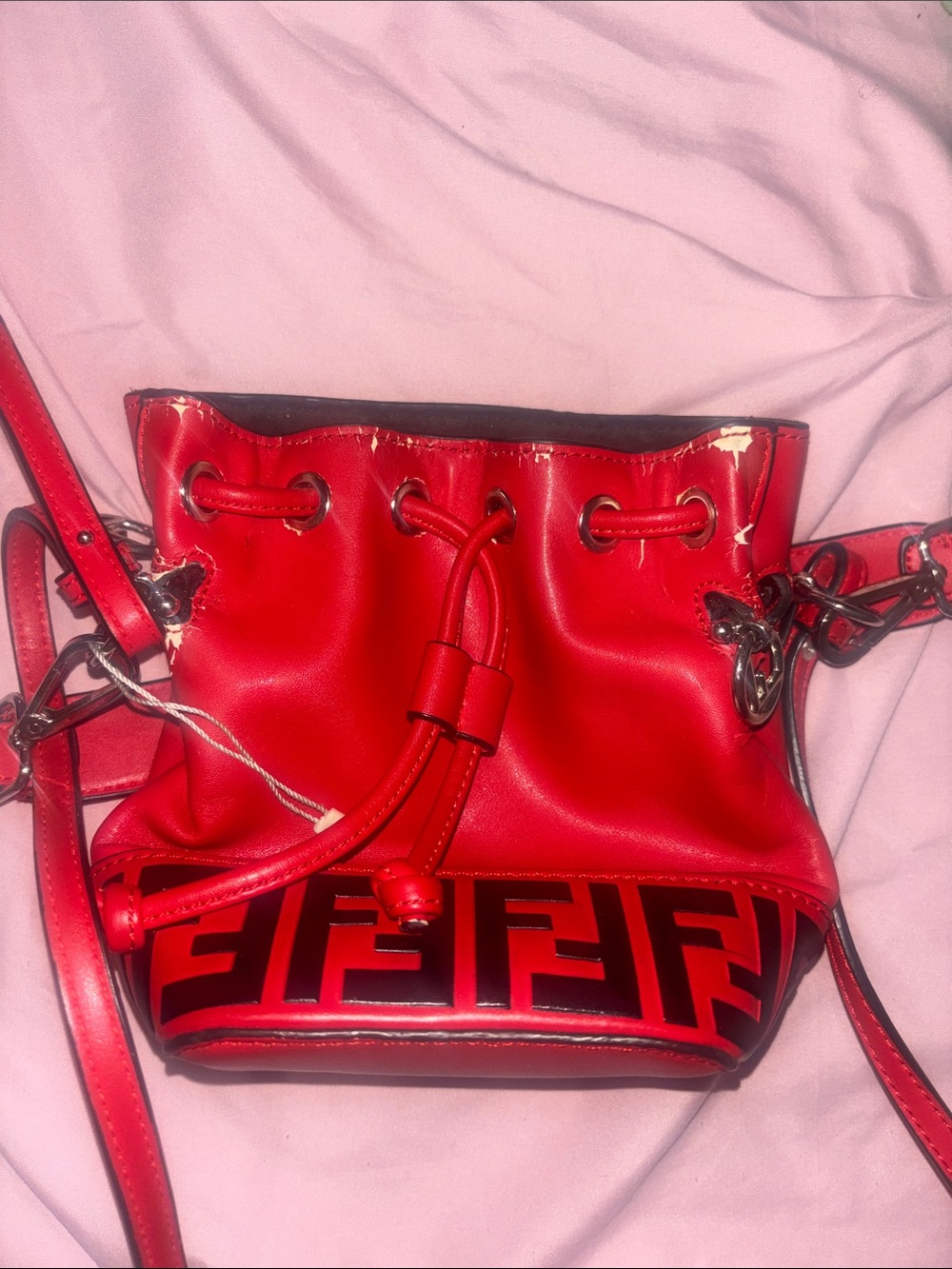 Red Leather Drawstring Bucket Bag with Logo Accent